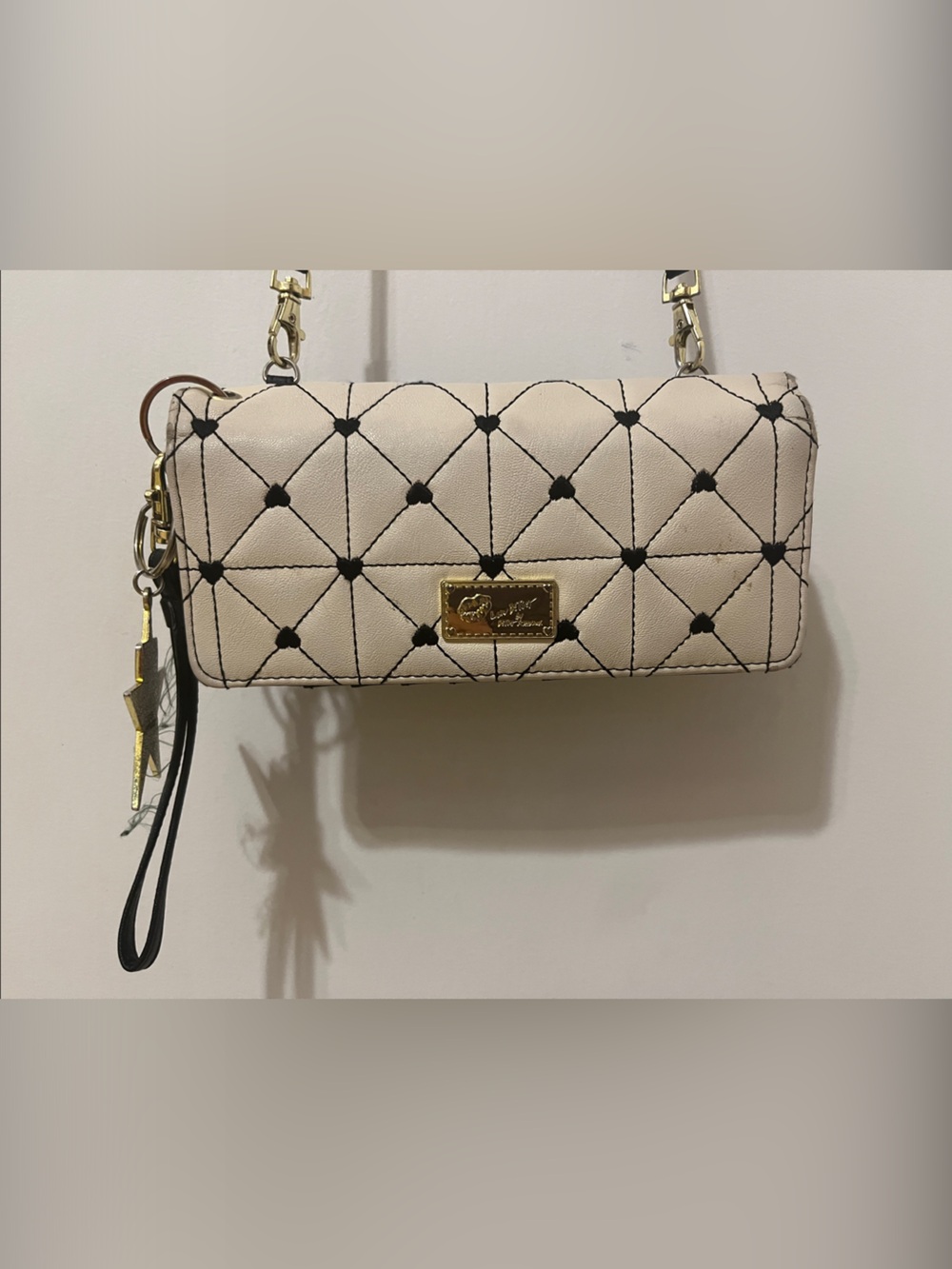 Betsey Johnson Wristlet Clutch in Cream with Gold Plaque